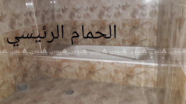 شقة بوسط الرمال شارع الثورة بعمارة سكنية حديثة البناء