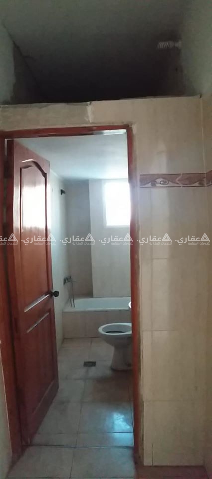 شقة مشطبة للبيع بعمارة سكنية