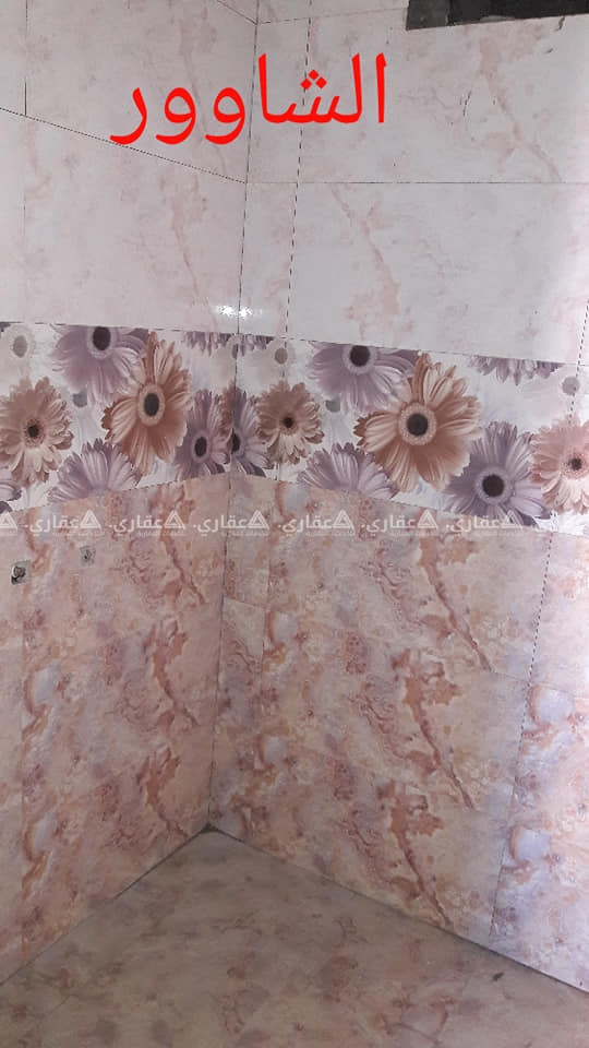شقة بوسط الرمال شارع الثورة بعمارة سكنية حديثة البناء