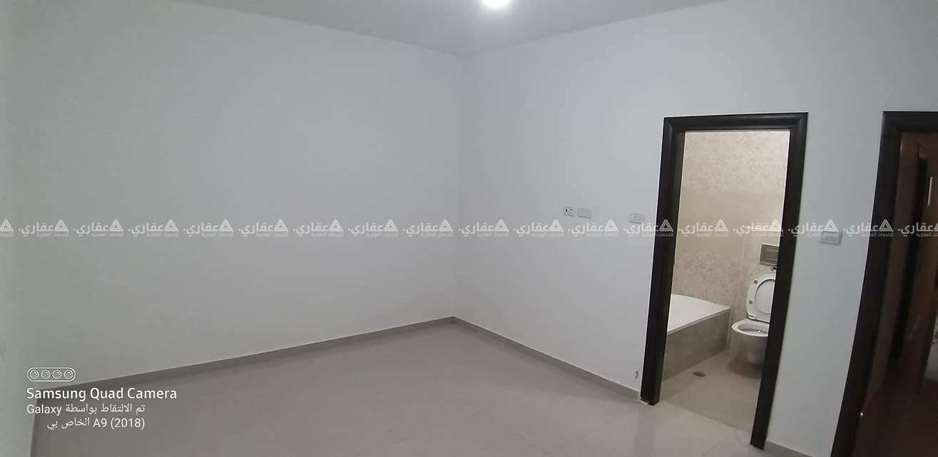 شقة تشطيب جديد كليا للايجار بعين منجد