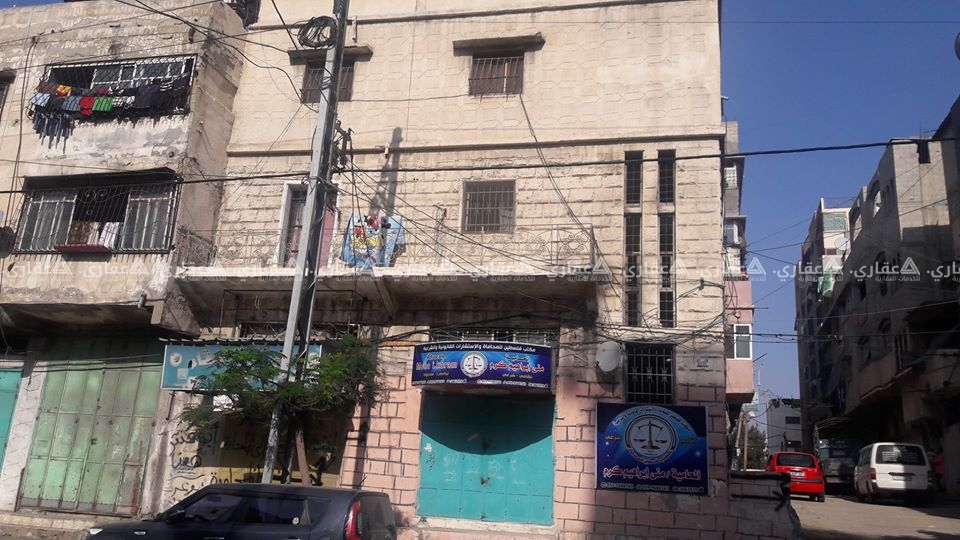 للبيع او البدل قطعة ارض مقام عليها عمارتين بناء قديم