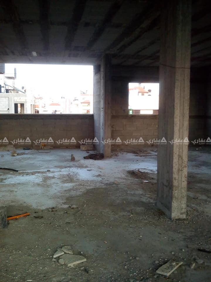 شقة عظم للبيع بعمارة على مكان مرتفع