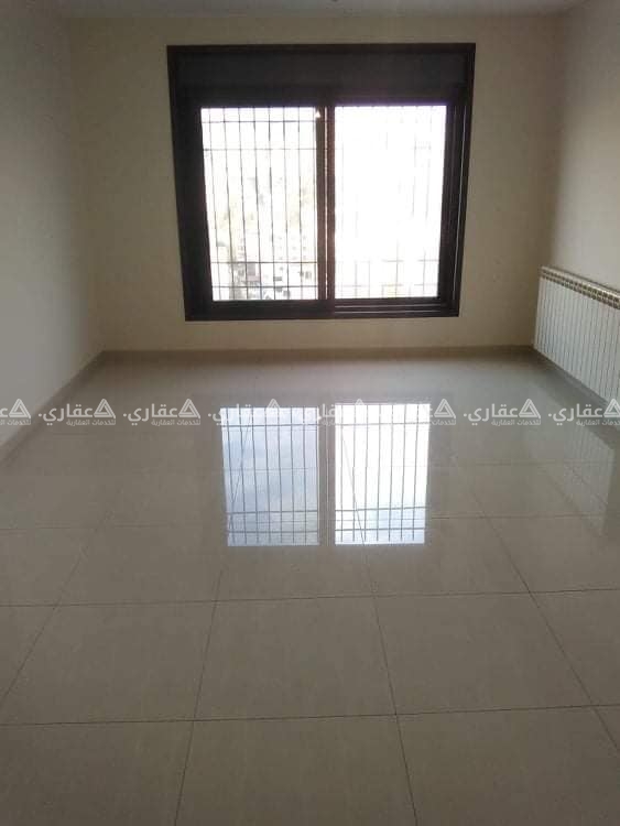 شقه فارغه للايجار في عين منجد