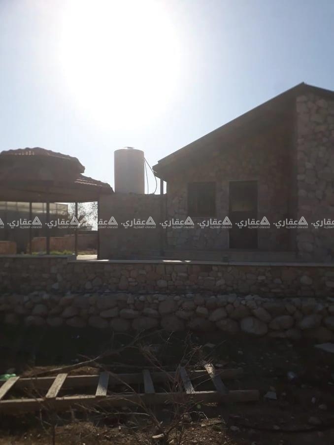  قطعة أرض للبيع مع بناء في العوجا