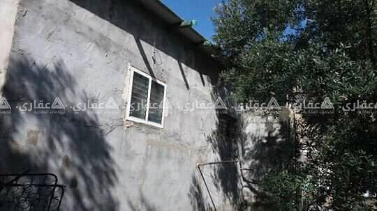 قطعه أرض مبني عليها منزل