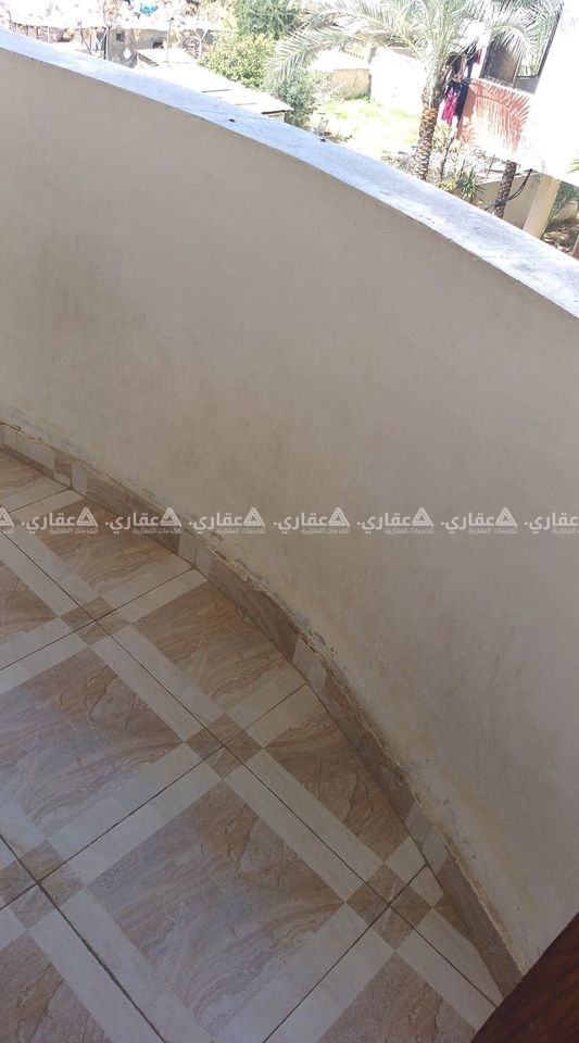 شقة بعمارة سكنية حديثة البناء