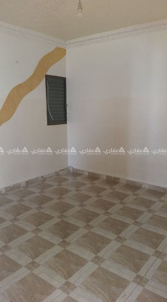 شقة بعمارة سكنية حديثة البناء