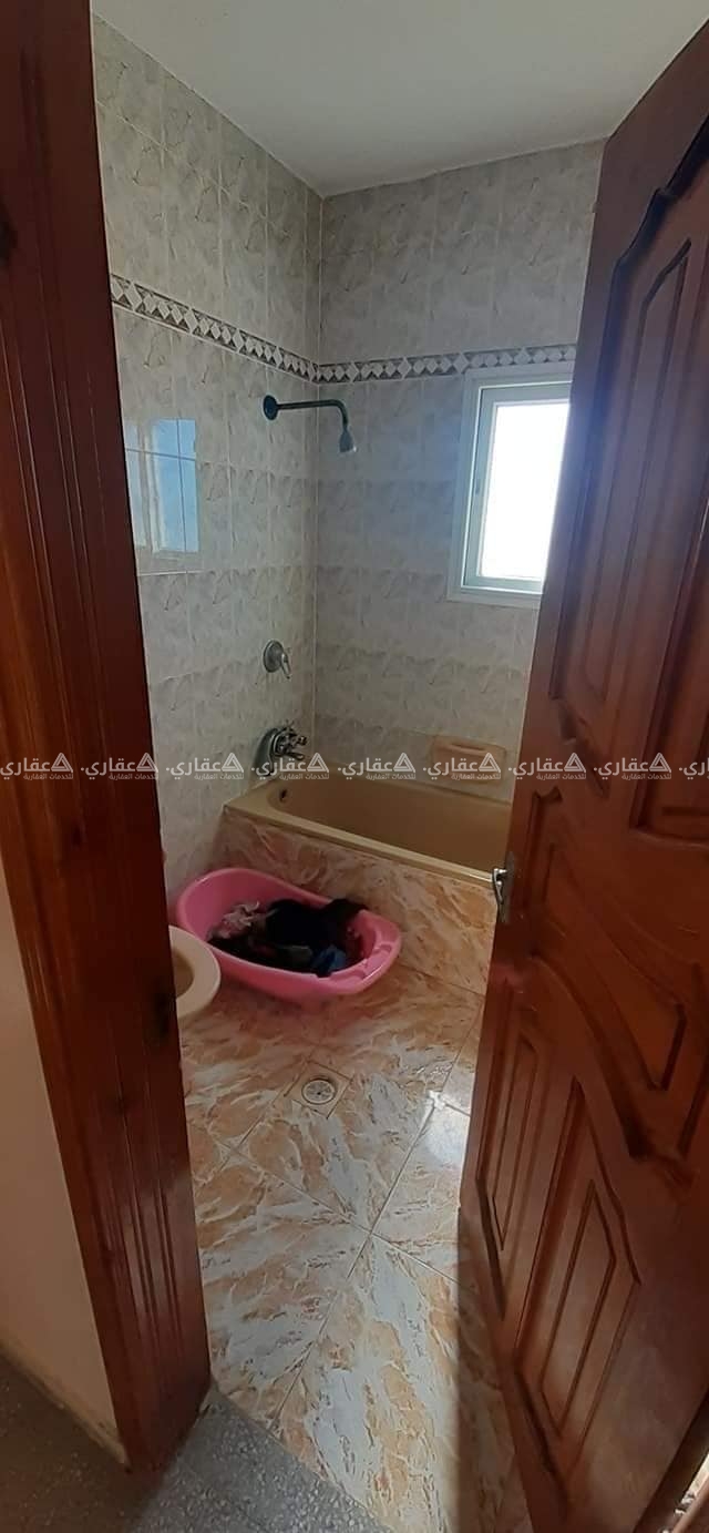 شقة في برج على شارع الرشيد العام (البحر) 