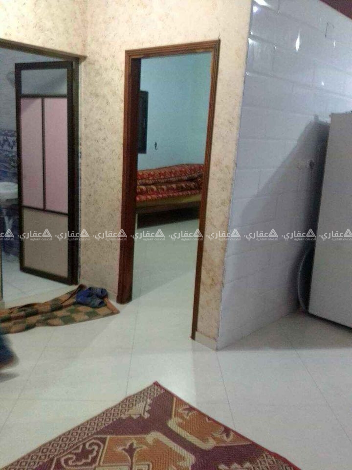 أرض مع منزل في المنطقة الزراعية
