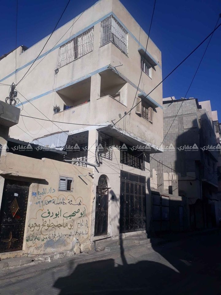 عمارة بالقرب من مسجد الشمعة
