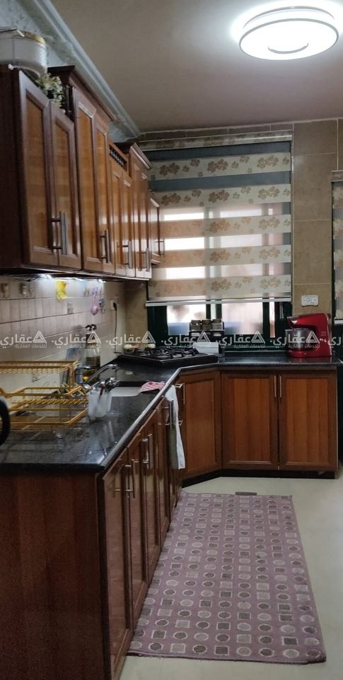 شقه للبيع خلف الكلية العصرية