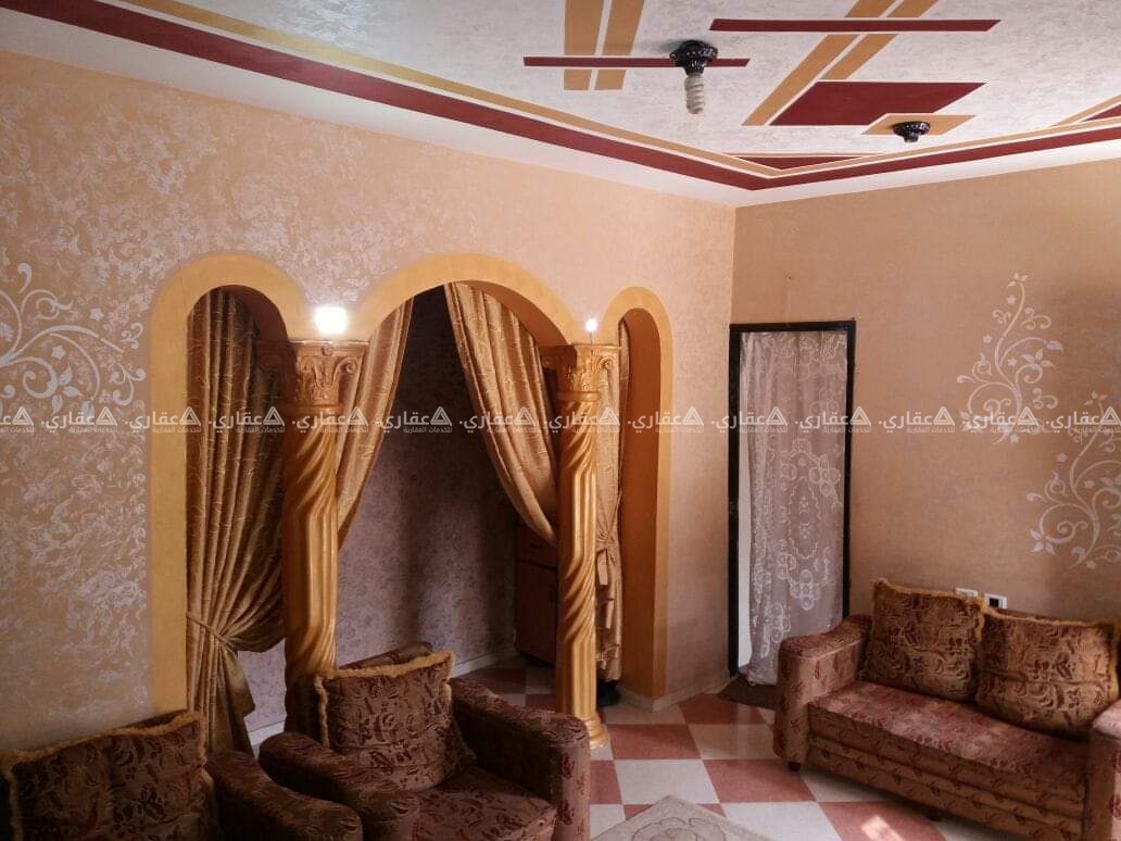 قطعة أرض مبني فيها طابق ارضي