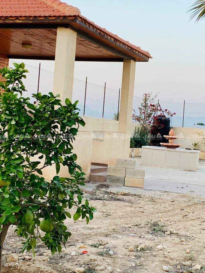 قطعة أرض مع بناء للبيع في العوجا