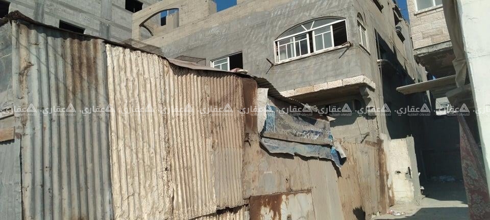 أرض مبني عليها طابقين للبيع