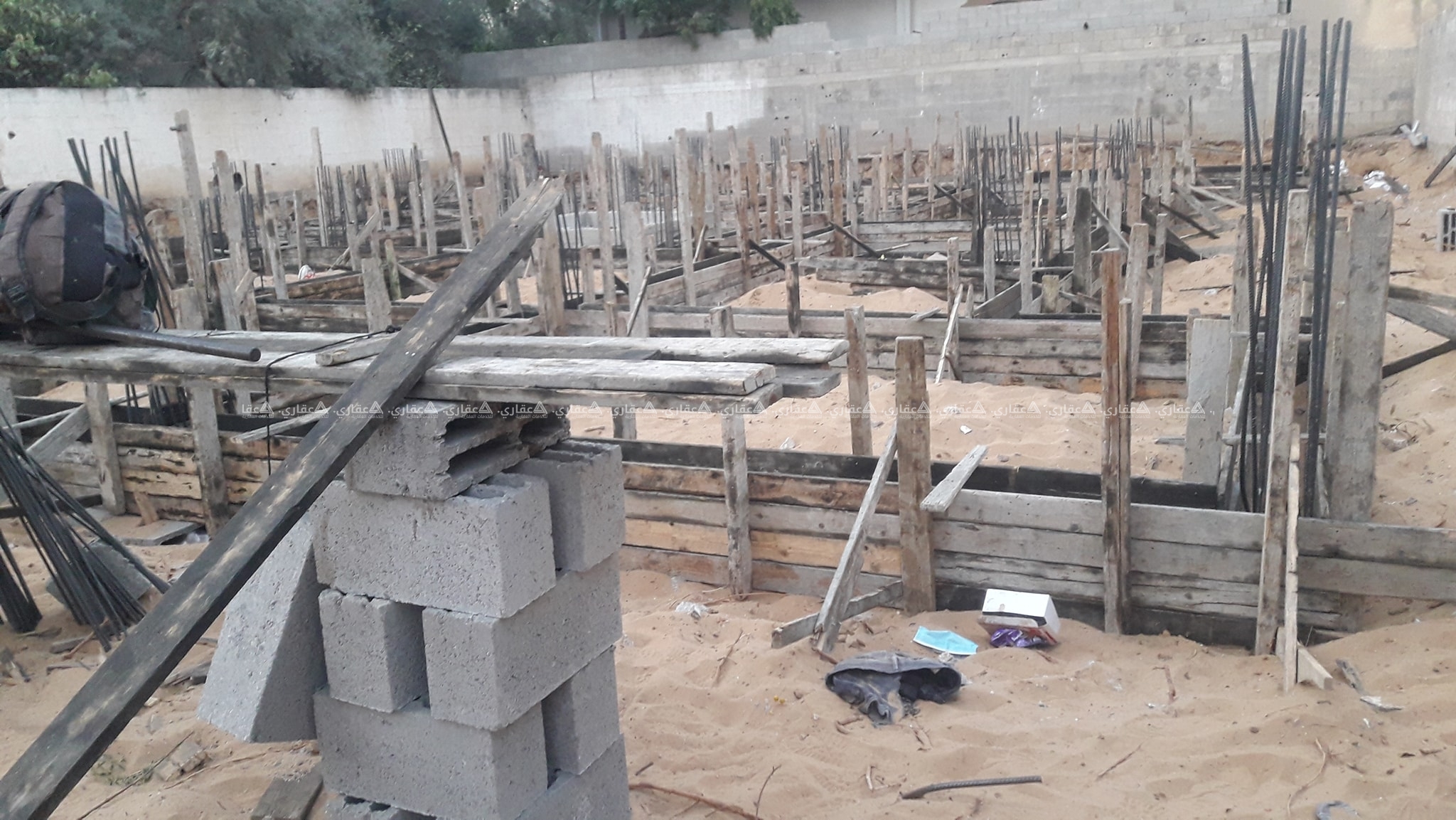 شقة عظم للبيع بعمارة قيد الإنشاء 