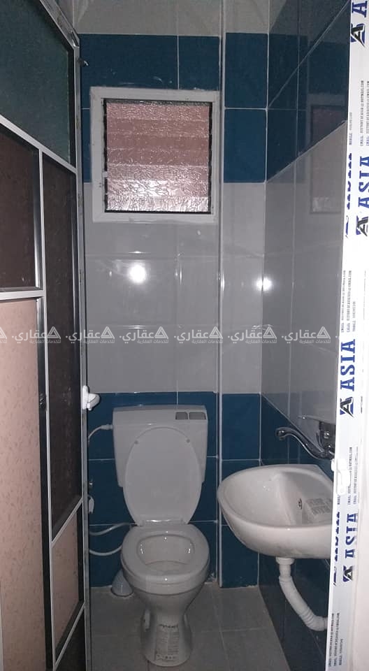 شقة مشطبة سوبر ديلوكس بعمارة سكنية حديثة البناء