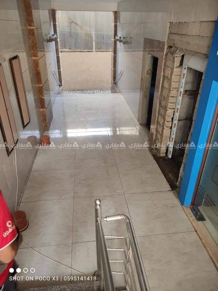 شقه عضم بتطل على شارع الوحدة الرئيسي