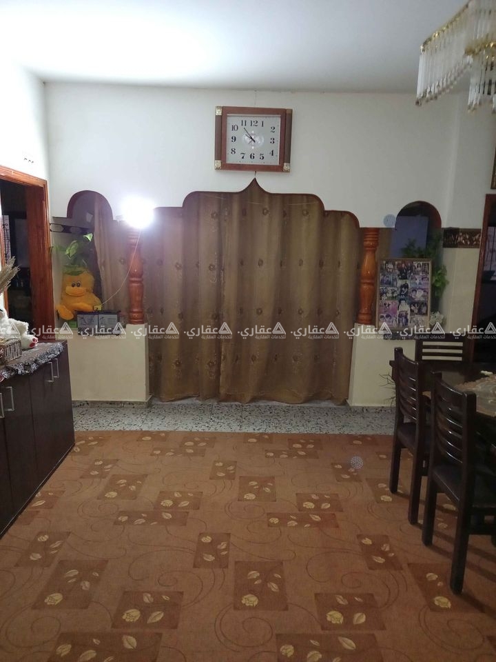 قطعة أرض مع منزل للبيع