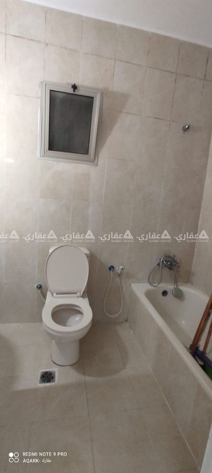 شقة غير مفروشة للإيجار مقابل الرامي موتورز