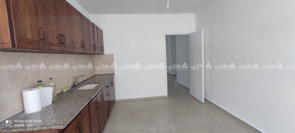 شقة غير مفروشة للإيجار مقابل الرامي موتورز