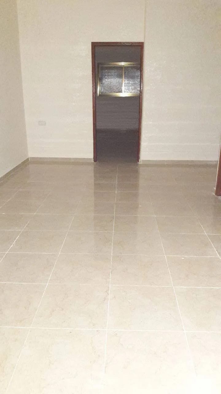 شقة للبيع في عمارة سكنية غرب شارع الولادة