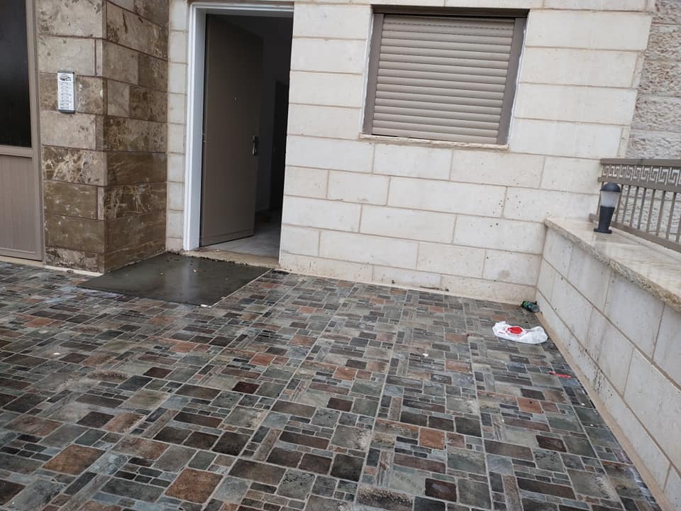 شقة جديدة أرضية للبيع