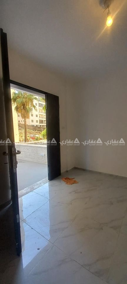 شقه أرضية غير مفروشه للإيجار 
