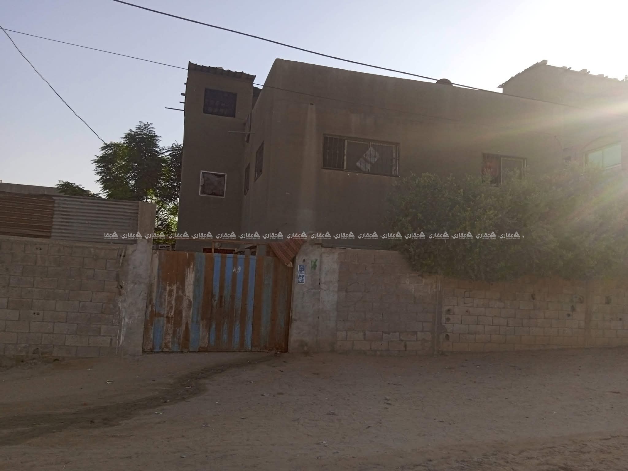 أرض مع بيت للبيع