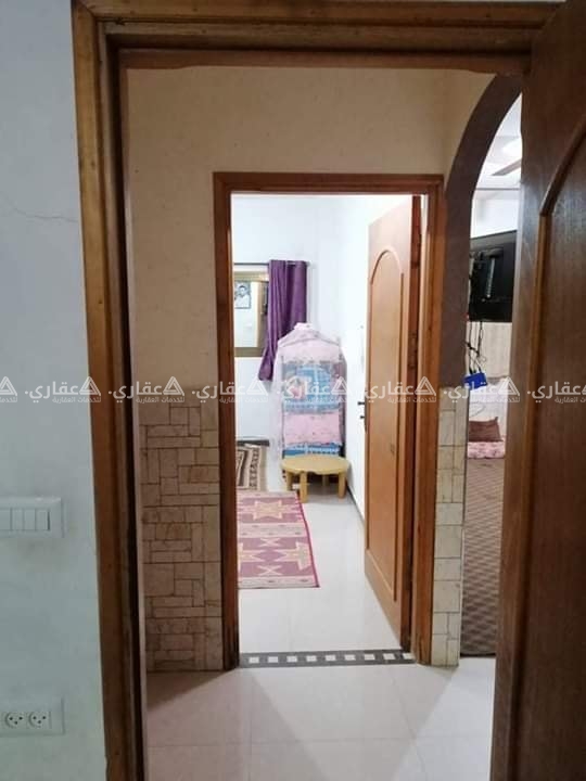 قطعة أرض مبني عليها منزل للبيع في حي البراق
