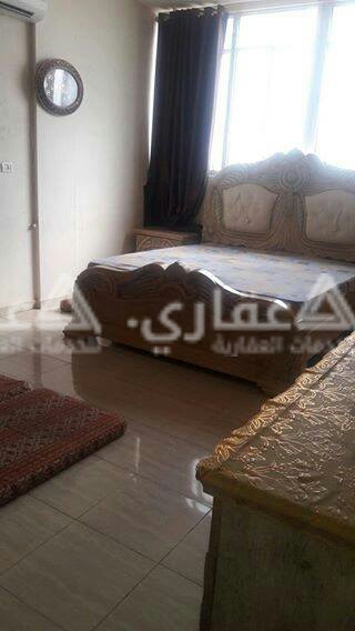 شقة للبيع في عمارة سكنية